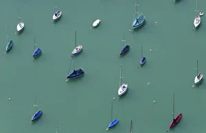 Boats moored in Starnberger lake near Tutzing Boats moored in Starnberger lake near Tutzing