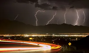 Bolts of lightning and vehicles on Interstate 215 light up northwest Las Vegas Bolts of lightning and vehicles on Interstate 215 light up northwest Las Vegas