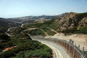 The border fence separating Spains northern enclave Ceuta and Morocco is seen from Ceuta The border fence separating Spains northern enclave Ceuta and Morocco is seen from Ceuta