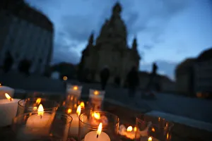 Candles lit outside Dresdens Frauenkirche cathedral in Dresden to commemorate the World Candles lit outside Dresdens Frauenkirche cathedral in Dresden to commemorate the World