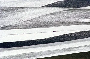 CAR DRIVES THROUGH SWISS LANDSCAPE AFTER RECENT SNOWFALLS CAR DRIVES THROUGH SWISS LANDSCAPE AFTER RECENT SNOWFALLS