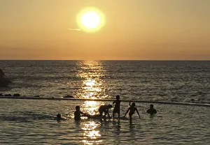 Children play in a pool in front of Punta Hermosa beach, south of Lima Children play in a pool in front of Punta Hermosa beach, south of Lima