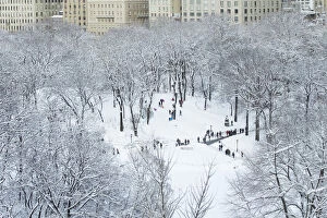 Images Dated 26th February 2010: Children sled on a hill inside of Central Park after a snowstorm in New York