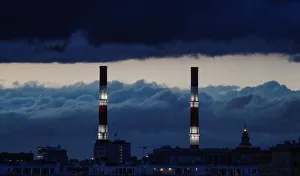 Chimneys of a heating power plant are pictured on a stormy evening in Moscow Chimneys of a heating power plant are pictured on a stormy evening in Moscow