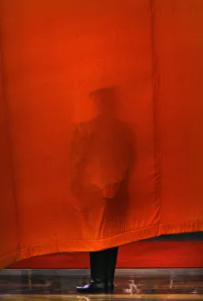 A Chinese soldier stands against curtain before official welcoming ceremony for British A Chinese soldier stands against curtain before official welcoming ceremony for British