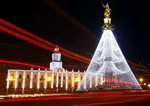 City Hall and the Freedom Monument are illuminated with Christmas decorations on the City Hall and the Freedom Monument are illuminated with Christmas decorations on the