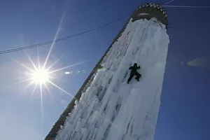 Images Dated 17th January 2016: An climber ascends a silo covered in ice in Cedar Falls