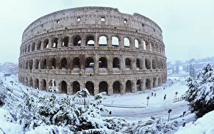 Ancient Roman Gallery: The Colosseum is seen during a heavy snowfall in Rome