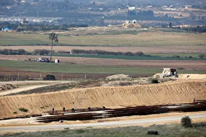 Construction work can be seen on the Israeli side of the border with the northern Gaza Construction work can be seen on the Israeli side of the border with the northern Gaza