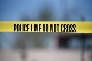 Crime scene tape blocks off an area designated for the media at the scene of a blast at a Crime scene tape blocks off an area designated for the media at the scene of a blast at a