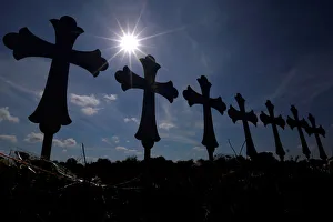 Crosses are seen placed at a memorial in memory of the victims killed in the shooting at Crosses are seen placed at a memorial in memory of the victims killed in the shooting at