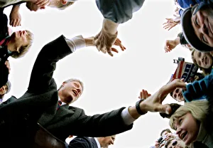 Democratic presidential candidate Bill Clinton reaches into the crowd during a campaign Democratic presidential candidate Bill Clinton reaches into the crowd during a campaign