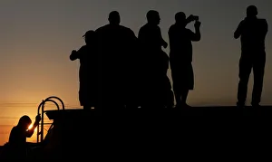Demonstrators gather atop a truck as during a truckers protest against high diesel fuel Demonstrators gather atop a truck as during a truckers protest against high diesel fuel