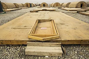 A door rests on the floor of a tent that has been dismantled as part of areas being A door rests on the floor of a tent that has been dismantled as part of areas being