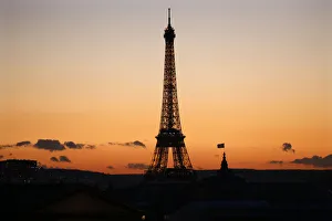 The Eiffel Tower is seen in silhouette at sunset in Paris The Eiffel Tower is seen in silhouette at sunset in Paris