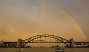 Images Dated 29th April 2009: Evening rainbow sets above the Sydney Harbour Bridge