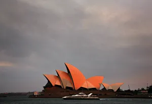 Ferry sails past the Sydney Opera House as smoke from bushfires can be seen above Ferry sails past the Sydney Opera House as smoke from bushfires can be seen above