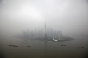 The financial district of Pudong is seen on a hazy day in Shanghai The financial district of Pudong is seen on a hazy day in Shanghai