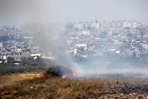 A fire burns in scrubland in Israel near the Gaza Strip A fire burns in scrubland in Israel near the Gaza Strip