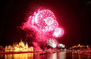 Fireworks explode over Danube River during Saint Stephens Day in Budapest Fireworks explode over Danube River during Saint Stephens Day in Budapest