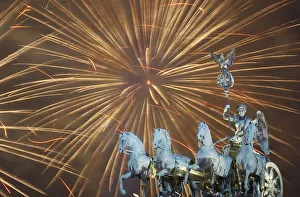 Fireworks explode during new year celebrations over the Brandenburger Tor gate in Berlin Fireworks explode during new year celebrations over the Brandenburger Tor gate in Berlin
