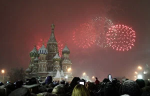 Images Dated 31st December 2010: Fireworks explode over St. Basil Cathedral at Red Square during New Years Day