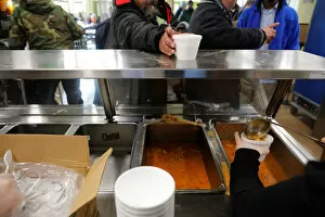 Images Dated 5th January 2018: Fish soup is served for lunch to homeless men sheltering in the Pine Street Inn
