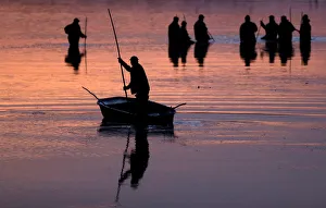 Fishermen set out to begin the traditional carp haul near the town of Trebon Fishermen set out to begin the traditional carp haul near the town of Trebon