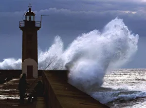 FISHERMEN TAKE SHELTER NEAR THE DOURO RIVER LIGHTHOUSE DURING A STORM FISHERMEN TAKE SHELTER NEAR THE DOURO RIVER LIGHTHOUSE DURING A STORM