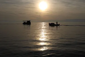 Fishermens boats are seen during a sunset in Kraljevica Fishermens boats are seen during a sunset in Kraljevica