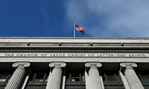A flag flies at half mask outside the world headquarters of the Mormon Church for Thomas A flag flies at half mask outside the world headquarters of the Mormon Church for Thomas