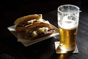Prints of Food and drink are seen at the Railway Tavern pub in east London February 2, 2012. Built around 1825, it is across the road from the athletes village Sport Prints: Print of the Railway Tavern pub in London, showing food and drink