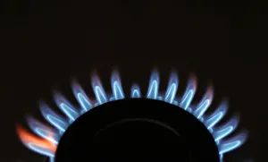 Gas flames are seen burning on a cooker in London Gas flames are seen burning on a cooker in London
