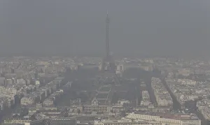 A general view shows the Eiffel tower and the Paris skyline through a small-particle haze A general view shows the Eiffel tower and the Paris skyline through a small-particle haze