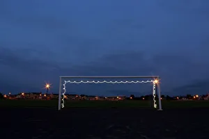 A goalpost is illuminated by a flashlight A goalpost is illuminated by a flashlight