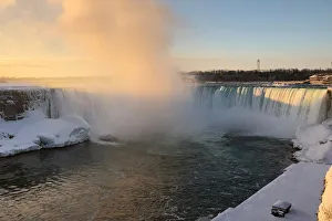 The Horseshoe Falls in Niagara Falls is lit by morning sun as viewed from the Canadian The Horseshoe Falls in Niagara Falls is lit by morning sun as viewed from the Canadian