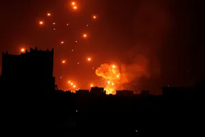 A Houthi arms depot explodes after it was hit by air strikes in Sanaa, Yemen A Houthi arms depot explodes after it was hit by air strikes in Sanaa, Yemen