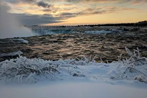 Ice and snow cover areas near the brink of the Horseshoe Falls in Niagara Falls on the Ice and snow cover areas near the brink of the Horseshoe Falls in Niagara Falls on the
