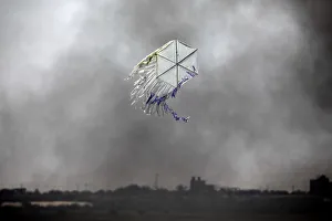 A kite flies over the border in an area where kites and balloons have caused blazes A kite flies over the border in an area where kites and balloons have caused blazes