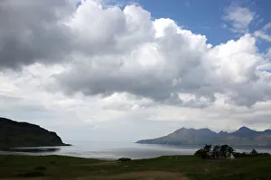 Lag Bay beach and the island of Rum are seen on the island of Eigg, Inner Hebrides Lag Bay beach and the island of Rum are seen on the island of Eigg, Inner Hebrides