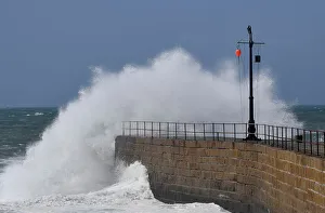 Large waves hit the harbour at Porthleven, Britain Large waves hit the harbour at Porthleven, Britain