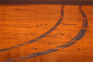 Images Dated 5th January 2018: A lifeguard truck leaves traces in the sand at low tide in Solana Beach, California