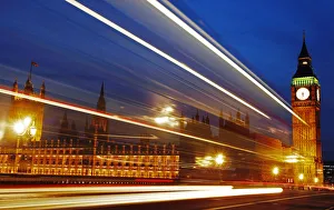 Light trails made by a passing bus illuminate the night sky in front of Britain's Light trails made by a passing bus illuminate the night sky in front of Britain's