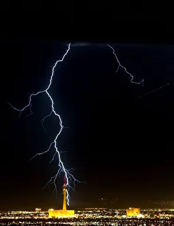 LIGHTNING STORM BEHIND STRATOSPHERE HOTEL AND CASINO IN LAS VEGAS LIGHTNING STORM BEHIND STRATOSPHERE HOTEL AND CASINO IN LAS VEGAS
