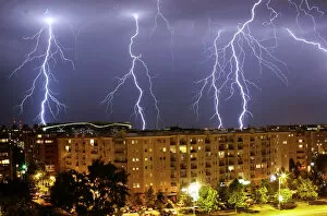 Weather Gallery: Lightning strikes over buildings during a thunderstorm in Belgrade