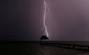 Lightning strikes the Caribbean as a thunderstorm passes Tankah Bay, near Tulum, southern Lightning strikes the Caribbean as a thunderstorm passes Tankah Bay, near Tulum, southern