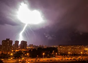 A lightning strikes are seen during a thunderstorm over the city of Minsk A lightning strikes are seen during a thunderstorm over the city of Minsk