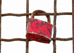 A love lock is seen attached to a metal fence near the canal of Port Said A love lock is seen attached to a metal fence near the canal of Port Said