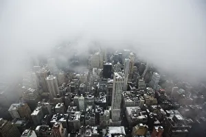Low lying clouds from a snowstorm obscure the skyline of New York Low lying clouds from a snowstorm obscure the skyline of New York