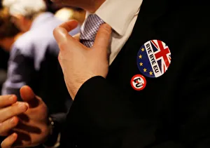 A man adjusts his tie at a Pro-Brexit event to celebrate the invoking of Article 50 after A man adjusts his tie at a Pro-Brexit event to celebrate the invoking of Article 50 after
